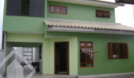 Casa em condomínio fechado com 3 quartos à venda na Rua São Salvador, 585, Mathias Velho, Canoas, 168 m2 por R$ 480.000