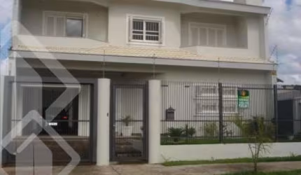Casa em condomínio fechado com 4 quartos à venda na Rua Áustria, 196, Marechal Rondon, Canoas, 270 m2 por R$ 1.060.000
