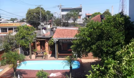 Casa com 3 quartos à venda na Rua Capiberibe, 318, Igara, Canoas, 256 m2 por R$ 1.250.000