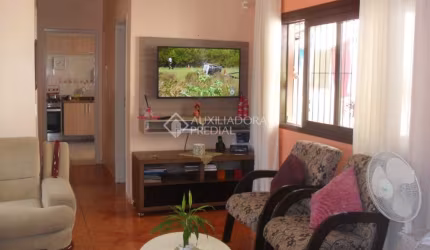 Casa com 4 quartos à venda na Rua Monteiro Lobato, 595, Igara, Canoas, 99 m2 por R$ 585.000