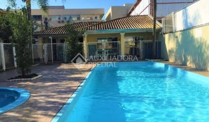 Casa em condomínio fechado com 3 quartos à venda na Avenida Santos Ferreira, 1180, Marechal Rondon, Canoas, 78 m2 por R$ 457.000