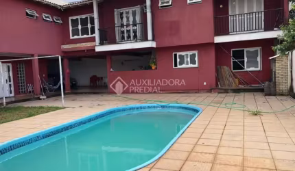 Casa em condomínio fechado com 5 quartos à venda na Rua Fermino Correa da Gama, 381, Vila Monte Carlo, Cachoeirinha, 440 m2 por R$ 1.400.000