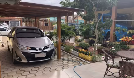 Casa com 2 quartos à venda na Rua Porto Rico, 1061, Sumaré, Alvorada, 120 m2 por R$ 422.000