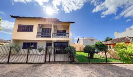 Casa com 3 quartos à venda na Rua Gago Coutinho, 381, Fátima, Canoas, 200 m2 por R$ 850.000