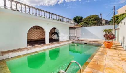 Casa com 4 quartos à venda na Rua Miracema, 134, Chácara das Pedras, Porto Alegre, 280 m2 por R$ 845.750