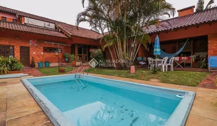 Casa em condomínio fechado com 4 quartos à venda na Rua Professor Ulisses Cabral, 590, Chácara das Pedras, Porto Alegre, 263 m2 por R$ 1.300.000