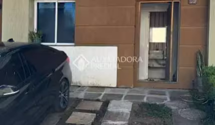 Casa em condomínio fechado com 3 quartos à venda na Rua Alberto Jerônimo Guerra, 20, Mário Quintana, Porto Alegre, 147 m2 por R$ 490.000