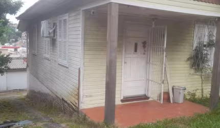 Casa em condomínio fechado com 2 quartos à venda na Rua Teixeira de Carvalho, 162, Medianeira, Porto Alegre, 360 m2 por R$ 390.000