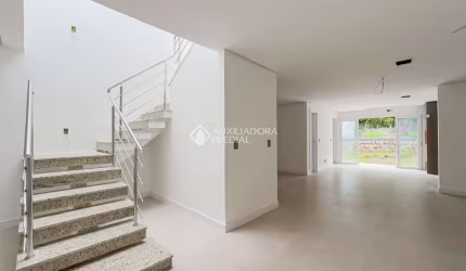 Casa com 3 quartos à venda na Avenida José Gertum, 570, Chácara das Pedras, Porto Alegre, 184 m2 por R$ 1.280.000