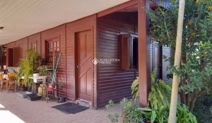 Casa com 3 quartos à venda na Rua Oito Mil e Quatorze, 293, Lageado, Porto Alegre, 104 m2 por R$ 350.000