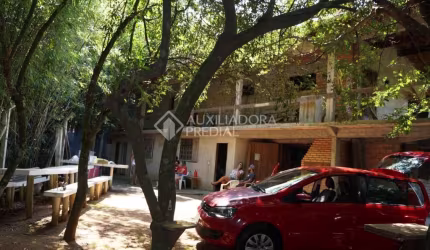 Casa em condomínio fechado com 3 quartos à venda na Rua Aloísio de Azevedo, 120, Jardim Krahe, Viamão, 320 m2 por R$ 479.000