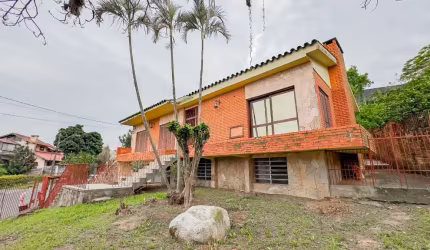 Casa em condomínio fechado com 3 quartos à venda na Rua Osmar Amaro de Freitas, 193, Jardim Itu Sabará, Porto Alegre, 304 m2 por R$ 513.999
