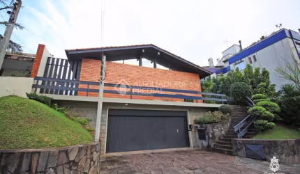 Casa em condomínio fechado com 4 quartos à venda na Travessa Java, 76, Jardim Lindóia, Porto Alegre, 399 m2 por R$ 1.095.000