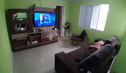 Casa em condomínio fechado com 3 quartos à venda na Rua Idelvira de Moura Almeida, 80, Jardim Leopoldina, Porto Alegre, 350 m2 por R$ 450.000