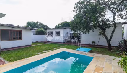 Casa em condomínio fechado com 4 quartos à venda na Rua João Paetzel, 821, Chácara das Pedras, Porto Alegre, 300 m2 por R$ 1.590.000