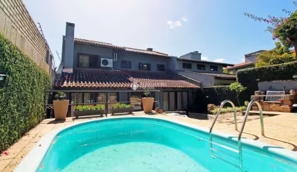 Casa com 4 quartos à venda na Rua Dona Lida Monteiro, 140, Teresópolis, Porto Alegre, 195 m2 por R$ 1.220.000