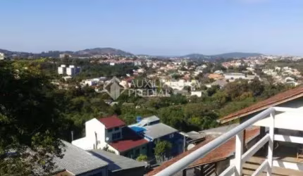 Casa com 3 quartos à venda na Rua Ângelo Passuelo, 330, Vila Nova, Porto Alegre, 570 m2 por R$ 650.000