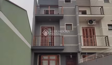 Casa com 3 quartos à venda na Rua Hugo Nelson Magalhães, 141, Rubem Berta, Porto Alegre, 152 m2 por R$ 429.000