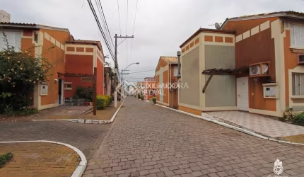 Casa em condomínio fechado com 4 quartos à venda na Rua Tenente Ary Tarrago, 1720, Jardim Itu Sabará, Porto Alegre, 84 m2 por R$ 480.000