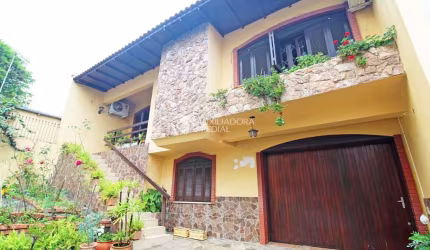 Casa em condomínio fechado com 3 quartos para alugar na Rua Umbú, 137, Passo da Areia, Porto Alegre, 154 m2 por R$ 6.500