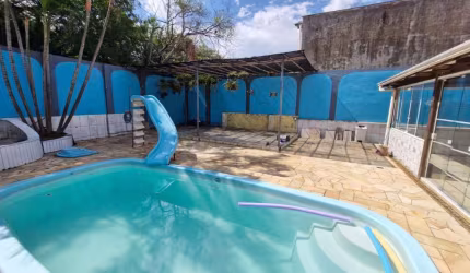Casa com 3 quartos à venda na Rua Ângelo Dourado, 260, Anchieta, Porto Alegre, 113 m2 por R$ 699.900