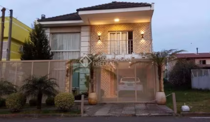 Casa em condomínio fechado com 3 quartos à venda na Rua Ronaldo Molina de Quadros, 330, Mário Quintana, Porto Alegre, 266 m2 por R$ 1.090.000