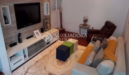 Casa em condomínio fechado com 3 quartos à venda na Rua Manoel Bandeira, 335, Jardim Itu Sabará, Porto Alegre, 226 m2 por R$ 950.000