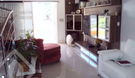 Casa em condomínio fechado com 4 quartos à venda na Rua Arnaldo Ballve, 512, Jardim Itu Sabará, Porto Alegre, 396 m2 por R$ 1.200.000