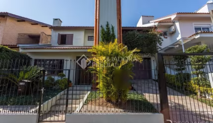 Casa em condomínio fechado com 4 quartos à venda na Rua Walir Zottis, 550, Jardim Itu Sabará, Porto Alegre, 293 m2 por R$ 1.070.000