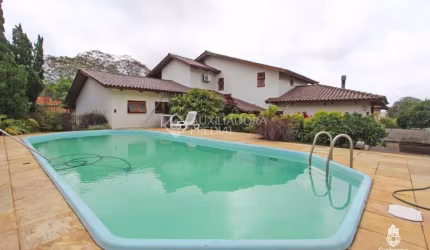 Casa em condomínio fechado com 3 quartos à venda na Avenida Assis Chateaubriand, 67, São Sebastião, Porto Alegre, 312 m2 por R$ 1.800.000