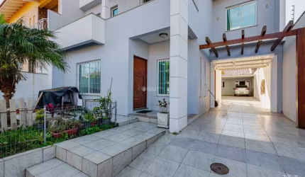 Casa com 4 quartos à venda na Avenida Edu Las Casas, 312, Parque Santa Fé, Porto Alegre, 240 m2 por R$ 760.000