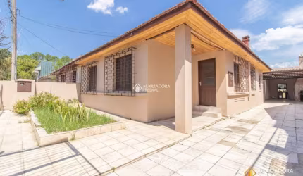 Casa com 3 quartos à venda na Rua São Nicolau, 1443, Santa Maria Goretti, Porto Alegre, 220 m2 por R$ 530.000