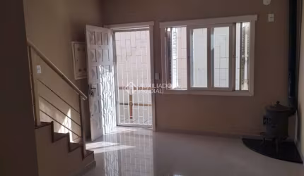 Casa em condomínio fechado com 3 quartos à venda na Rua Erechim, 1001, Nonoai, Porto Alegre, 100 m2 por R$ 380.000