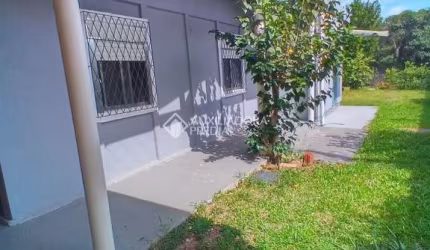 Casa com 3 quartos à venda na Siqueira Campos, 300, Stella Maris, Alvorada, 155 m2 por R$ 650.000