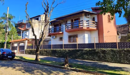 Casa em condomínio fechado com 4 quartos à venda na Rua Batista Xavier, 146, Partenon, Porto Alegre, 240 m2 por R$ 845.500