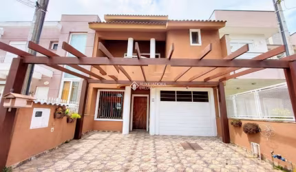 Casa em condomínio fechado com 3 quartos à venda na Rua Guatambu, 106, Hípica, Porto Alegre, 209 m2 por R$ 650.000