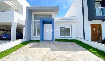 Casa em condomínio fechado com 3 quartos à venda na Rua Jorge Babot Miranda, 680, Aberta dos Morros, Porto Alegre, 137 m2 por R$ 630.000