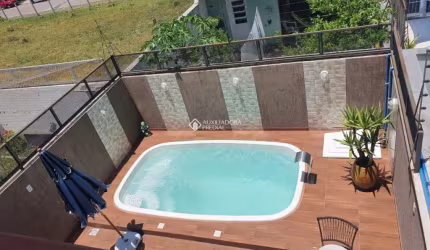 Casa em condomínio fechado com 3 quartos à venda na Rua Aldo Sani, 164, Hípica, Porto Alegre, 144 m2 por R$ 729.900