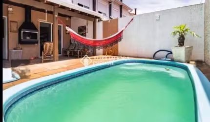 Casa em condomínio fechado com 3 quartos à venda na AVENIDA EDGAR PIRES DE CASTRO - DE 1740 A 2238 - L, 2520, Hípica, Porto Alegre, 83 m2 por R$ 408.000