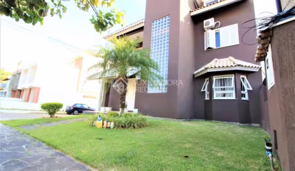 Casa em condomínio fechado com 3 quartos à venda na Rua Álamo, 96, Hípica, Porto Alegre, 230 m2 por R$ 760.000