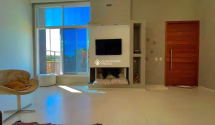 Casa com 3 quartos à venda na Rua Luiz Delfino, 210, Espírito Santo, Porto Alegre, 155 m2 por R$ 999.900