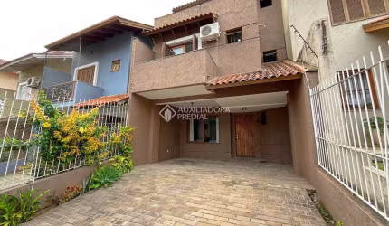 Casa com 3 quartos à venda na Rua Helio Felix Frey, 162, Espírito Santo, Porto Alegre, 125 m2 por R$ 500.000