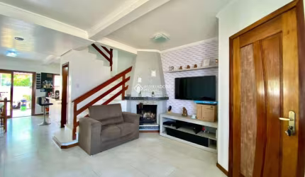 Casa em condomínio fechado com 3 quartos à venda na Rua Embira, 96, Hípica, Porto Alegre, 105 m2 por R$ 499.000