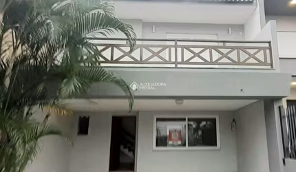 Casa em condomínio fechado com 3 quartos à venda na Rua Angico, 49, Hípica, Porto Alegre, 143 m2 por R$ 680.000