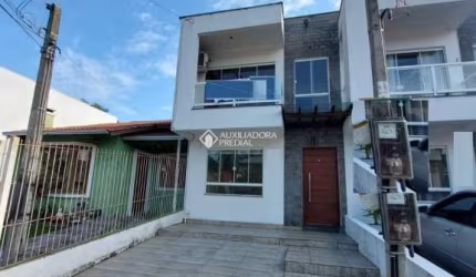 Casa com 2 quartos à venda na Avenida Nossa Senhora de Guadalupe, 1025, Hípica, Porto Alegre, 100 m2 por R$ 448.900