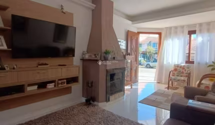 Casa com 3 quartos à venda na Rua Edgar Sanches Laurent, 46, Hípica, Porto Alegre, 180 m2 por R$ 750.000