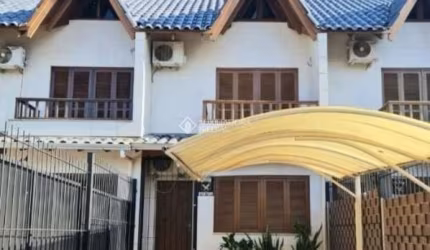 Casa com 2 quartos à venda na Rua Heitor Kramer, 250, Guarujá, Porto Alegre, 83 m2 por R$ 422.990