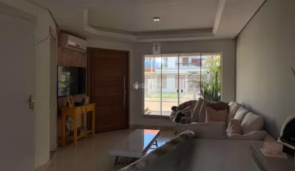Casa em condomínio fechado com 3 quartos à venda na Rua Álamo, 69, Hípica, Porto Alegre, 300 m2 por R$ 900.000