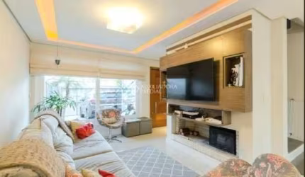 Casa com 3 quartos à venda na Rua Wilson Conceição Bona, 133, Hípica, Porto Alegre, 200 m2 por R$ 725.000