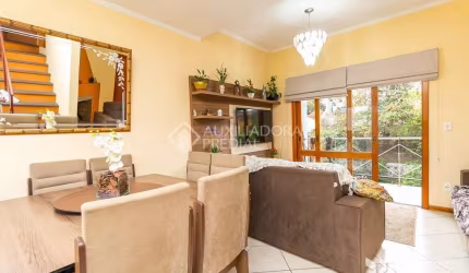 Casa em condomínio fechado com 3 quartos à venda na Rua Jamil Antônio José, 46, Nonoai, Porto Alegre, 145 m2 por R$ 560.000